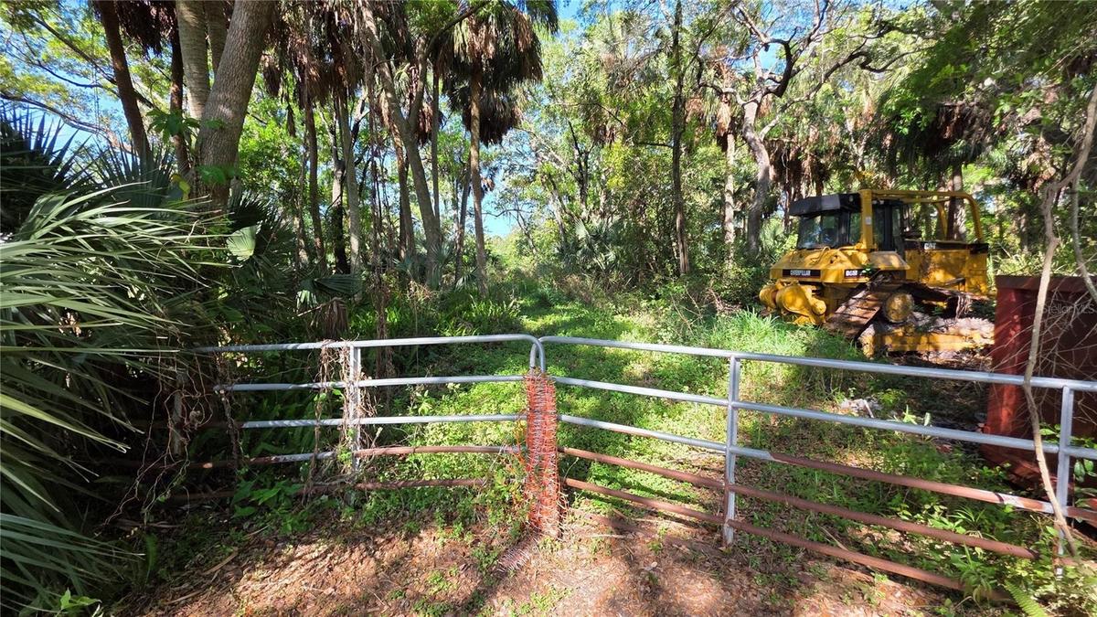 Gate entrance into Lot B off 49th Street – 1.33 Acres.