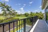Primary bedroom balcony overlooks gold course