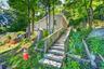 Stairs leading to a shared parking lot with 46 Bowen.