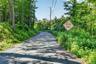 When entering Bowen Court bear right into this dead end road, which leads you to the developed portion of the land as well as all 6 single-family home