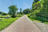 A long driveway leading to 35 Bowen Court ensures exceptional privacy and seclusion.
