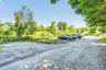 Between 37 and 46 Bowen Court, a large parking lot offers abundant parking and added convenience for residents and guests.