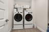 Upstairs washer dryer on pedastools