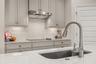 all stainless steel appliances and beautiful backsplash