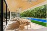 covered patio overlooking pool