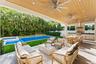 covered patio with summer kitchen