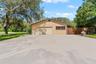 2-car garage and oversized driveway provide ample parking space.