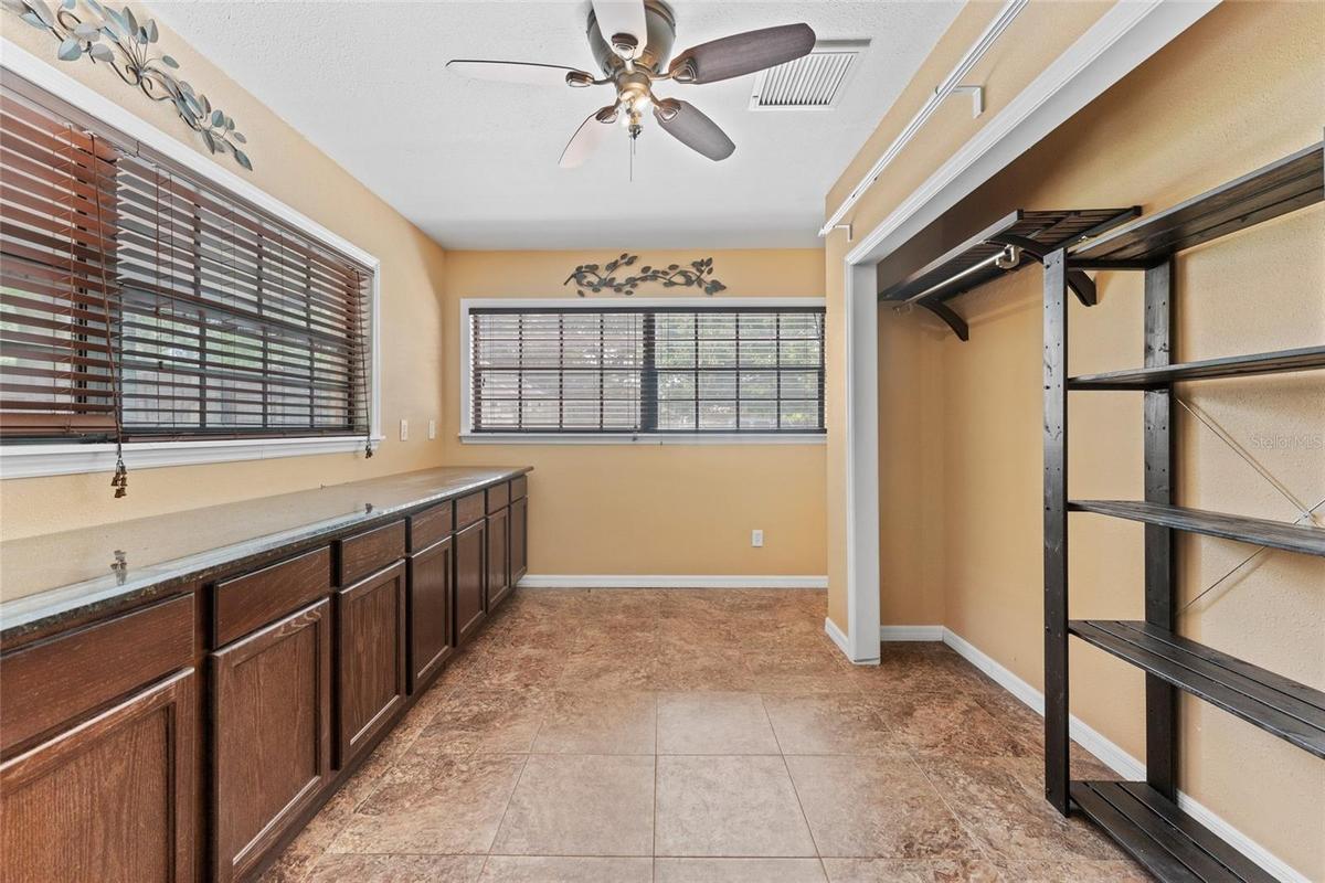 Office is 12' x 8', with ceramic tile, built-in cabinets, storage closet, and a ceiling fan.