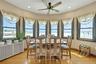 Dining room surrounded by Hurricane Windows and breathtaking views