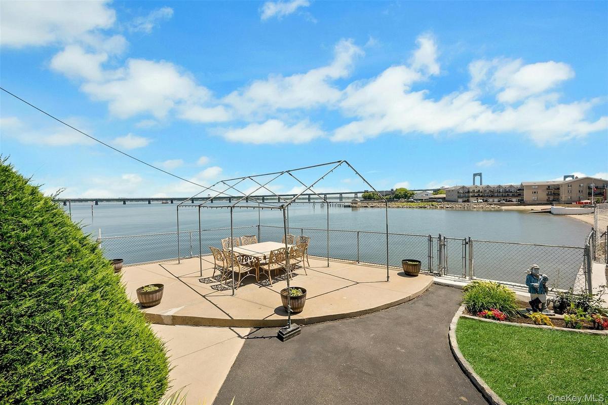 Spacious Canopy Patio with unobstructed views of Long Island Sound and the Throggs Neck Bridge