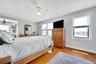 Primary Bedroom with Hurricane Windows and direct water views