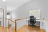 Cool additional Loft office workspace.  Great view of the oak trees and neighborhood.