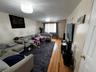 1st floor living room in primary unit