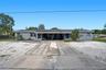 Ample parking for both residences in their private carports, out front, along the corner lot and in the spacious driveways