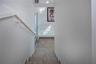 Stairs to third level unit