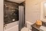 Full updated bath in hall on upper level
