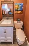 Half bath off of living room/kitchen