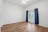 Primary Bedroom with a Balcony