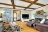 Living Room opens to Foyer and Kitchen
