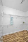 This closet is as big as a bedroom.