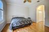 Spacious primary bedroom - hallway to his/her closets