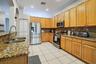 Kitchen with granite counter tops & newer appliances