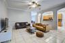Spacious family room & open counter top area to kitchen