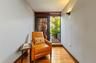 Reading area at primary bedroom and exit to terrace