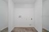 laundry hookups in closet primary bedroom