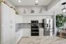 Kitchen with an oversized quartz island