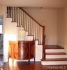 Graceful staircase in center hall