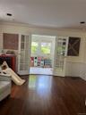 Sunroom through French doors off living room