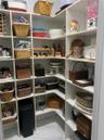 walk-in pantry with solid shelving