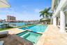 Resort-style pool and spa creating a stunning waterfront retreat.