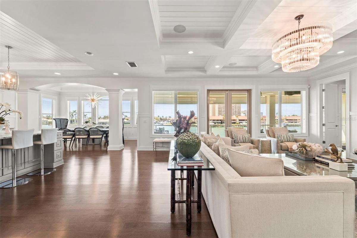Expansive open living space that moves seamlessly between the living room, dining room, and kitchen flowing to your private outdoor balcony with stunn