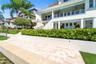 Property features 75 feet of waterfront with a durable concrete seawall less than 10 years old, the property is fenced at that level with turf grass a