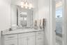 Bedroom 4's private vanity area also has marble vanity and floor