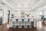 Oversized kitchen with island bar seating, Viking appliances, dual ovens, wine cooler & tons of storage - perfect for entertaining