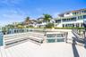 Convenient trex dock and seating, fish cleaning & prep station with attached aluminum ladder to water access