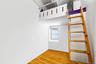 Room with lofted sleeping or storage