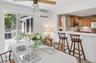 The family room is open to the kitchen and back deck.