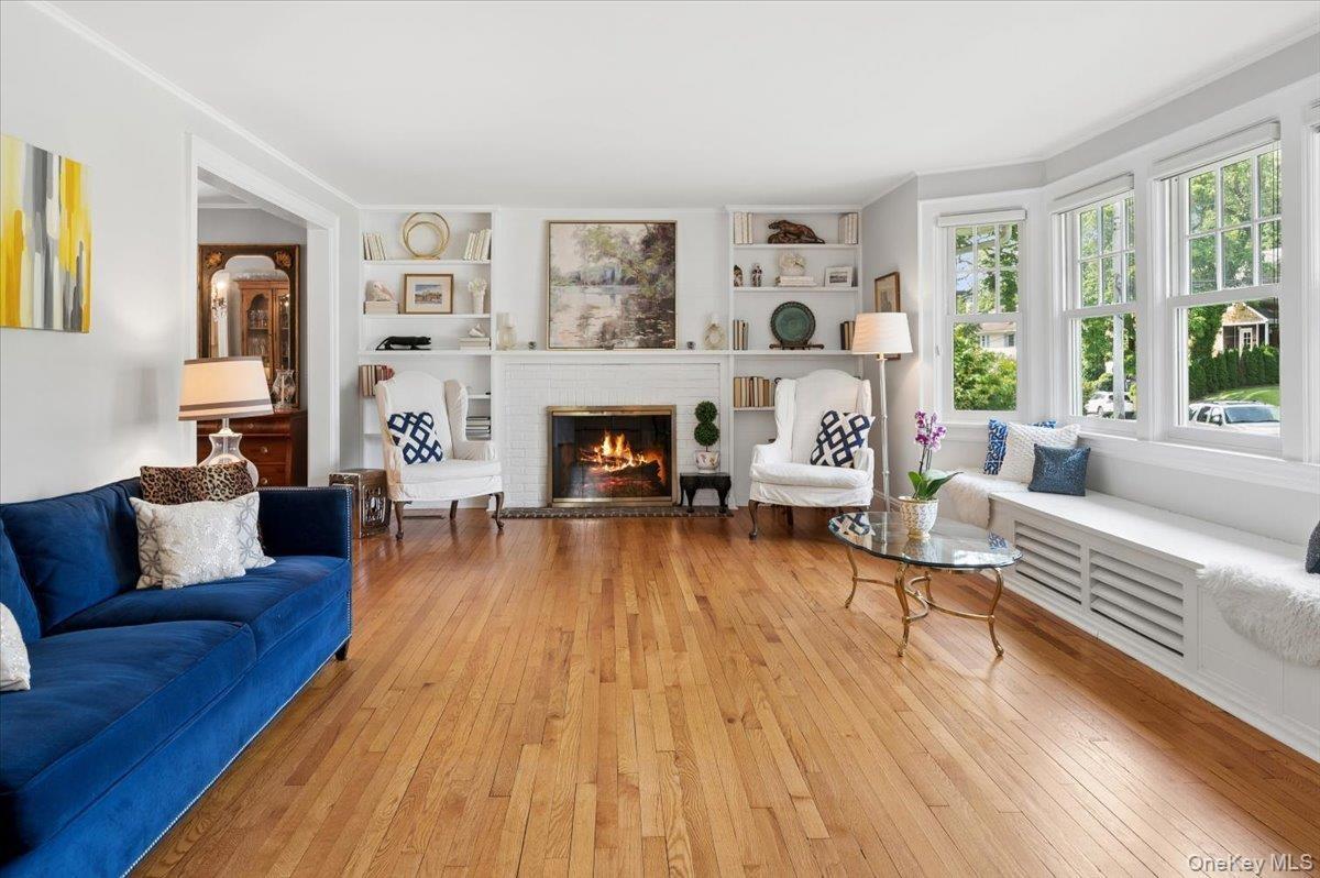Very large living room with a gas fireplace.  Love the built-ins and mantel.