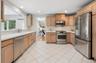 Large updated eat-in kitchen overlooking the family room.