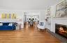 The arch into the dining room allows light to fill the first floor.