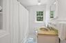 Hall bath with vanity.