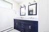 Double sinks with marble counter