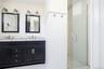 Glass shower enclosure