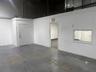 View of private bathroom entrance and office entrance.