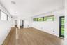 Second floor media room with access to private balcony