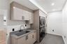 Laundry with double stacked washer dryer